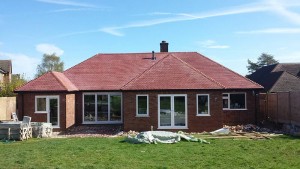 First glace after the windows were completed. Once the landscaping is complete this will be a lovely looking property.